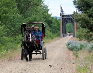 A wagon heads east after crossing Yakima River trestle.