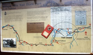 Two closures on eastern section of Willapa Hills Trail are superimposed on this trail sign