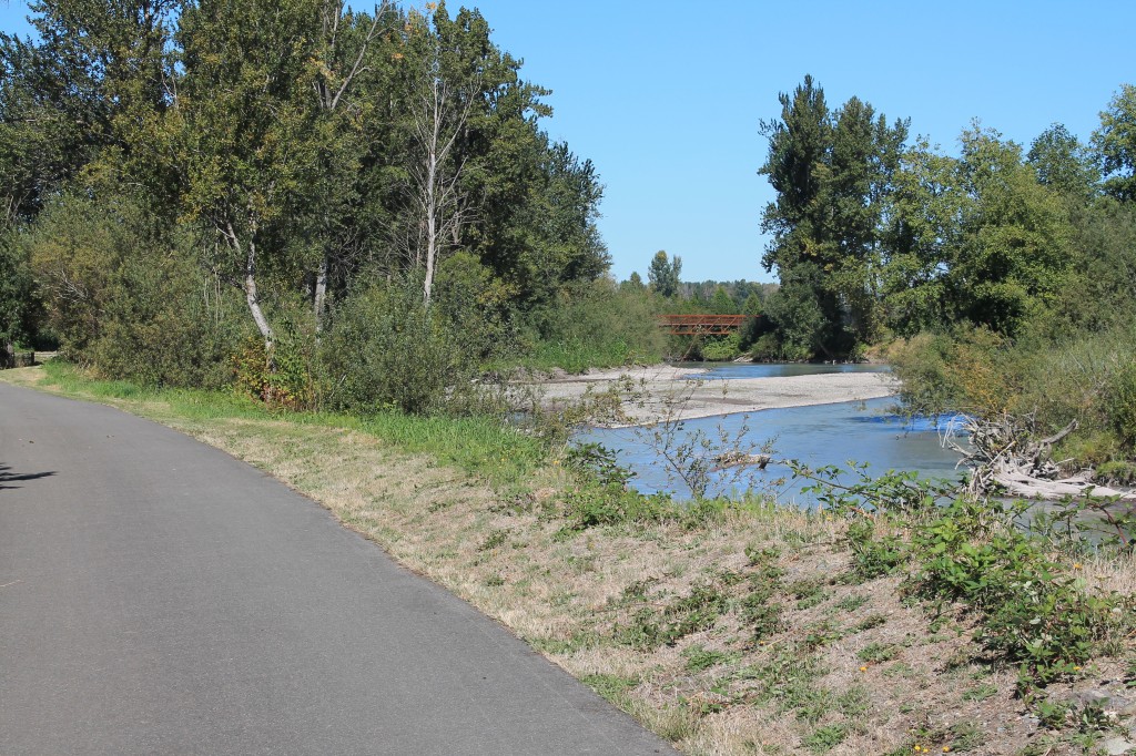 A small bridge crosses the White River on the Sumner Link Trail