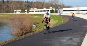 Cyclists already are using smooth pavement on reopened Green River Trail
