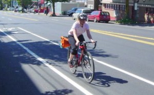 Cyclist rides in Stone Way section with bike lanes